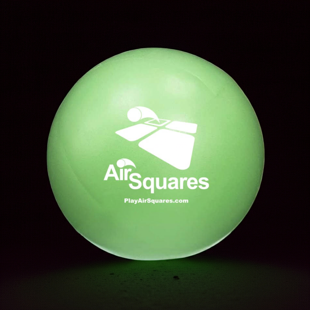 Glowing green ball with Air Squares logo on a Dark background